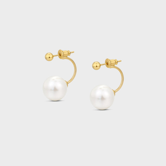 Large pearl statement earrings